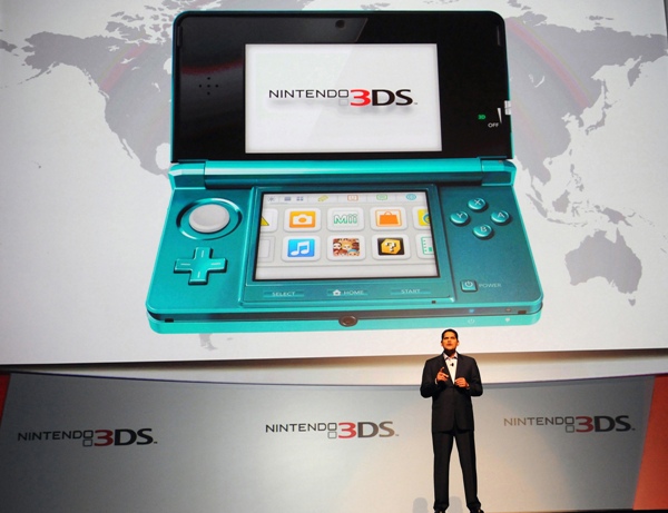 In this photo provided by Nintendo of America, Reggie Fils-Aime, president and coo of Nintendo of America, announces upcoming game titles for the Nintendo 3DS system during the company's presentation on the opening day of the 2011 Electronic Entertainment Expo (E3), June 7, 2011 in Los Angeles. The E3 is the video game industry's premier trade show. (Photo by Nintendo of America, Bob Riha, Jr.) No Sales